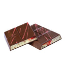 Chocolate bar with a creamy cheesecake filling and biscuit crust pieces, shown sliced to reveal the rich, layered texture.