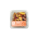 Crispy freeze-dried peach slices with a soft orange hue, offering a sweet and juicy flavor
